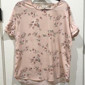 Floral pink blouse with ruffled short sleeves
